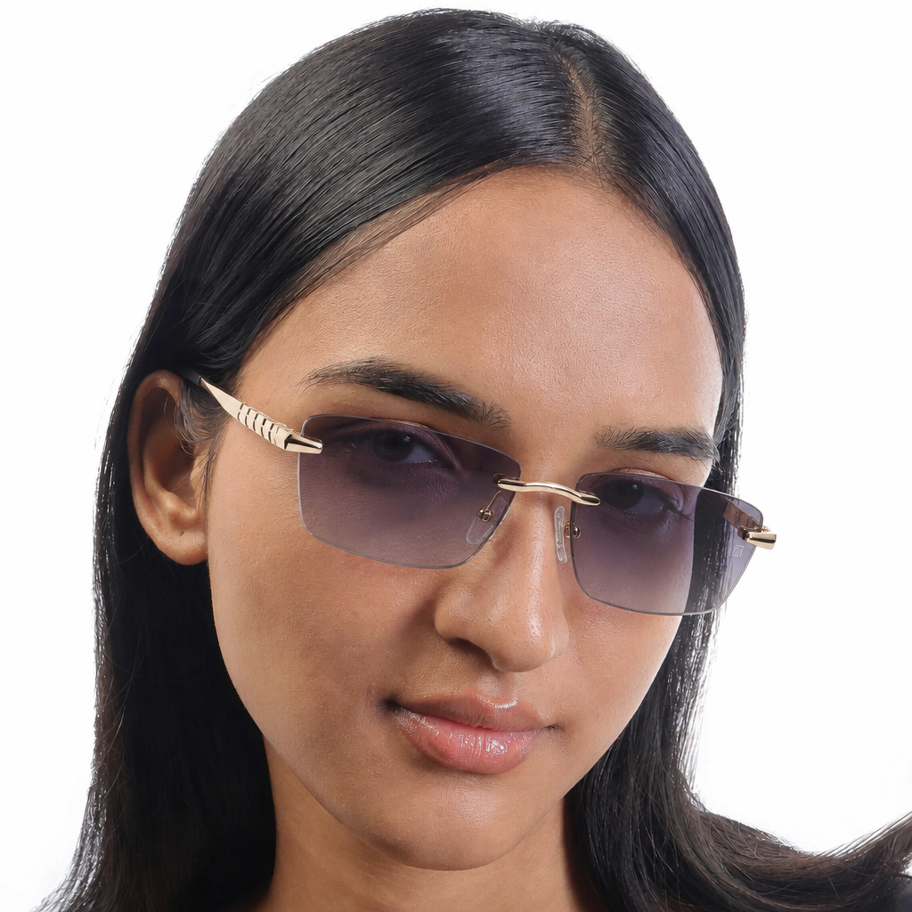 Woman wearing Tom Miller Select 003 rimless sunglasses, gold frame