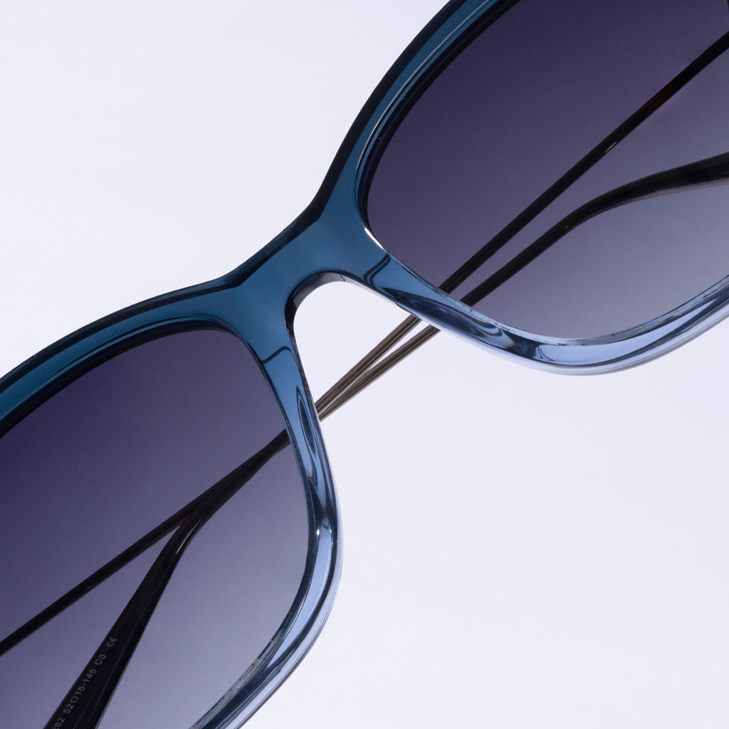 Tom Miller Elite 012 cat eye sunglasses, silver & blue frame, grey lens